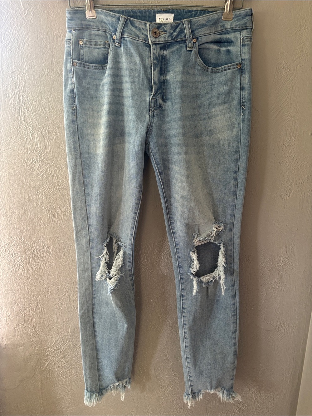 Distressed Light Blue Skinny Jeans - Slim Fit